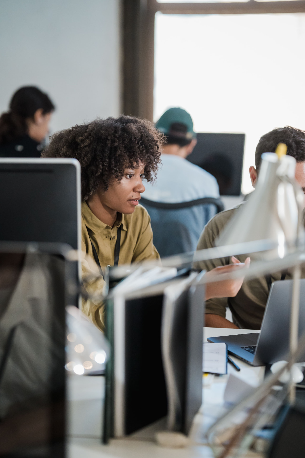 Focused trader working at a modern trading desk